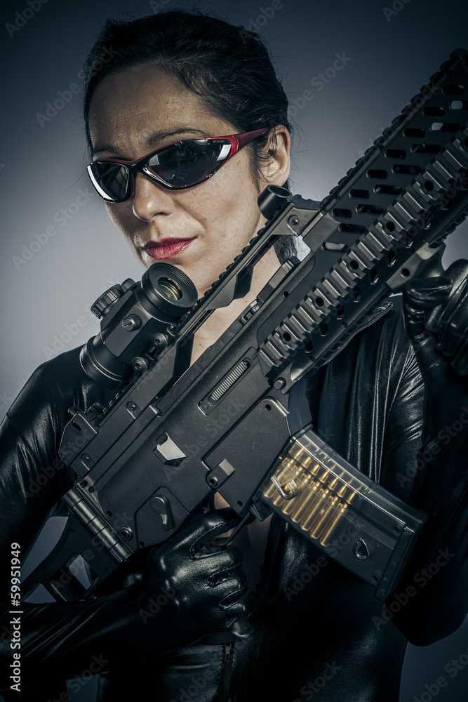 Fototapeta premium American, Sexy girl military woman posing with guns.
