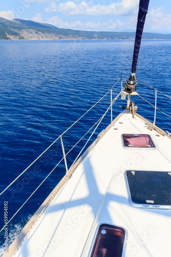 Bow of sailing boat / yacht with blue sea © Zechal