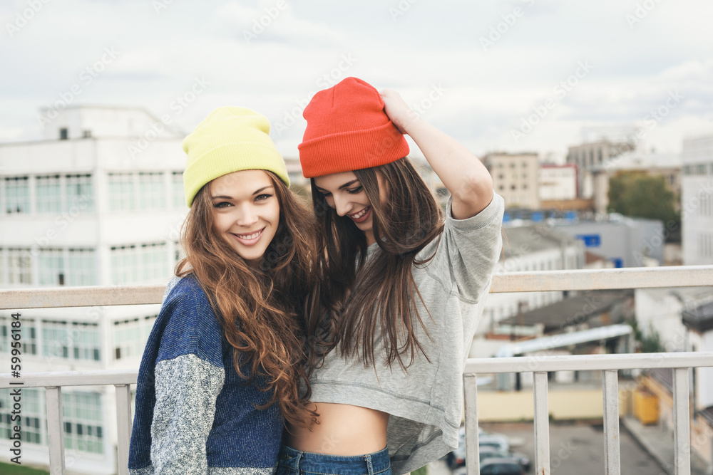 Two young hipster girl friends Two young hipster girl friends