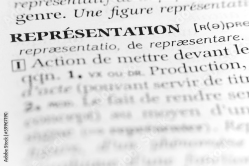 Macro shot of the word “représentation” in a French dictionary with shallow depth of field, symbolizing meaning, communication, interpretation, and abstract concepts
