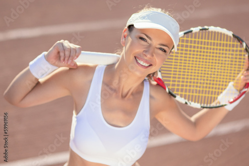 Happy Smiling Female Tennis Athlete © danmorgan12