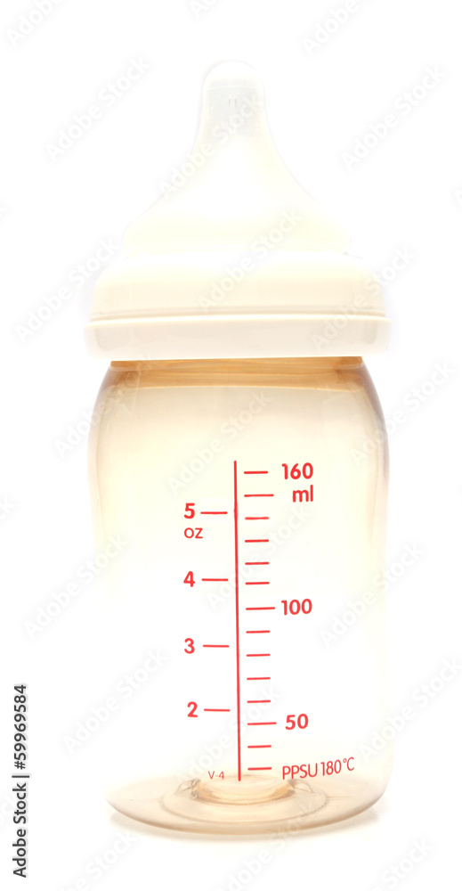 close-up baby milk bottle isolated on white background close-up baby milk bottle isolated on white background