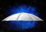 Umbrella under raindrops