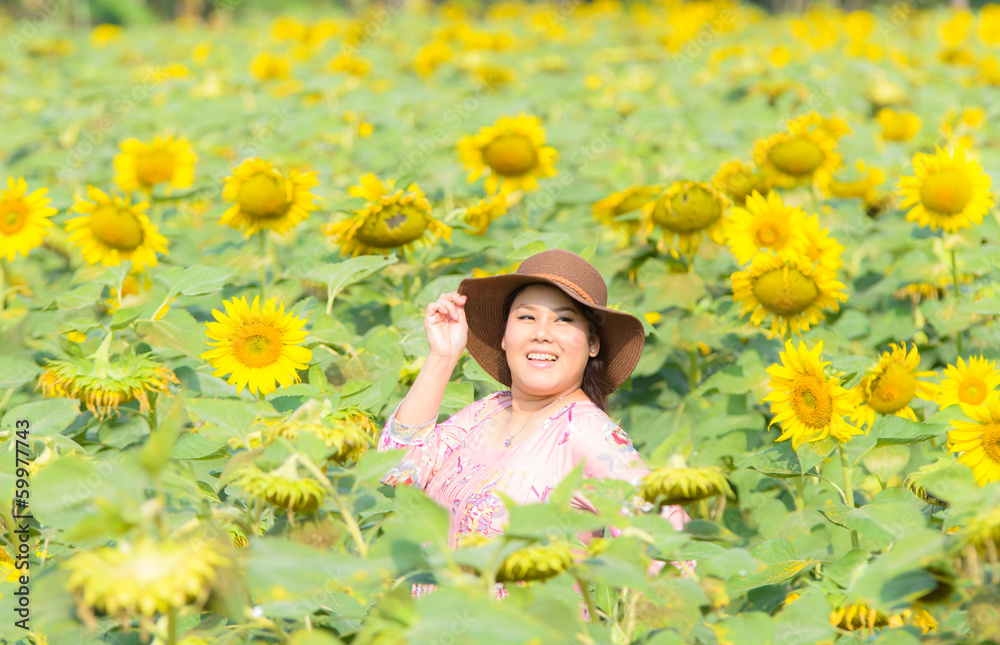 Portrait women asian in sun flowers field Portrait women asian in sun flowers field