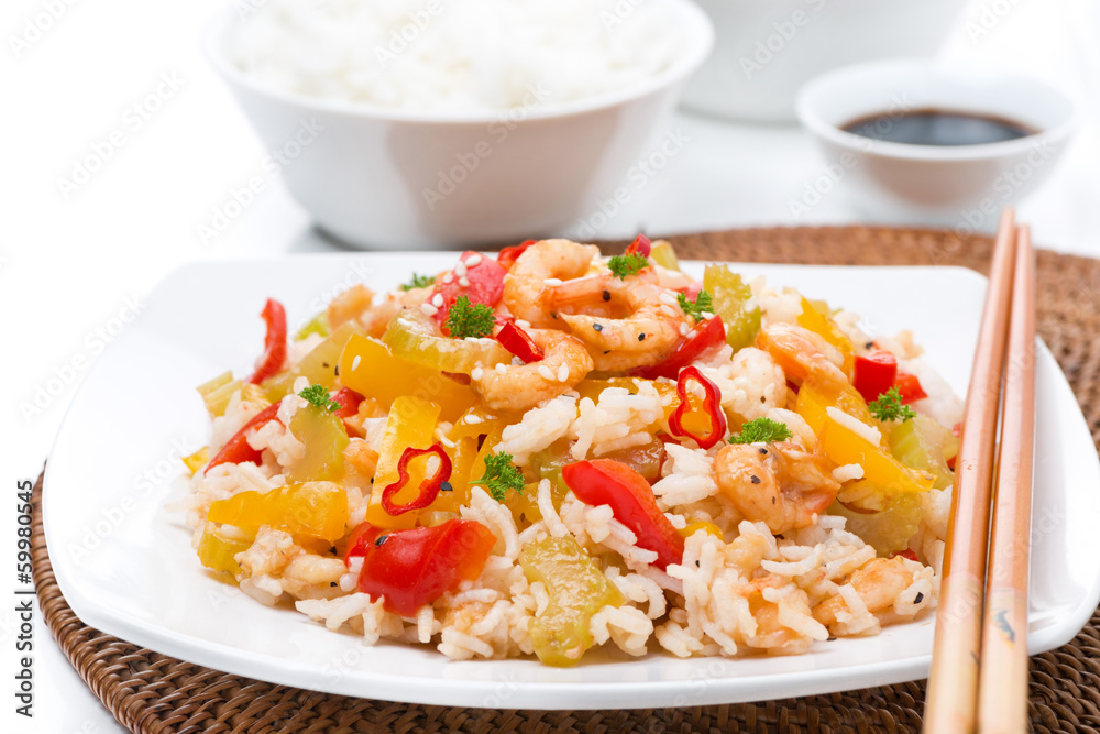 Chinese food - white rice with vegetables and shrimps on a plate Chinese food - white rice with vegetables and shrimps on a plate