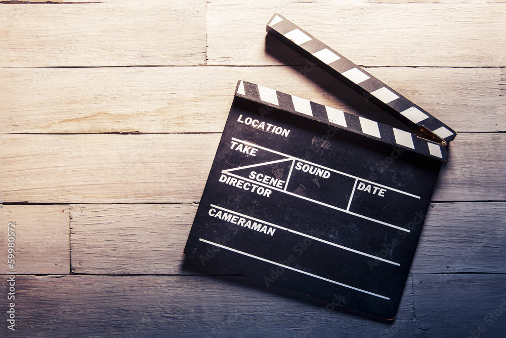 movie slate on a wooden background