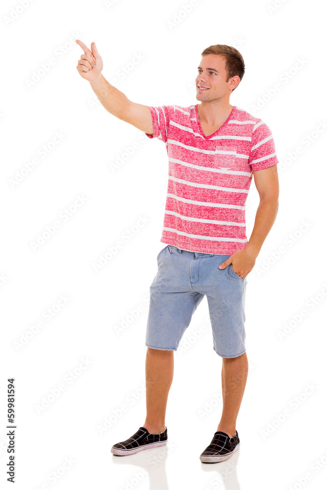 cute young man pointing empty copy space cute young man pointing empty copy space