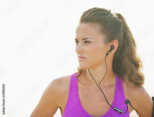 Portrait of fitness young woman outdoors