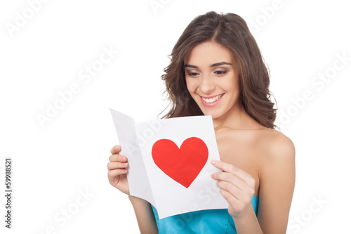 Reading a Valentine card.