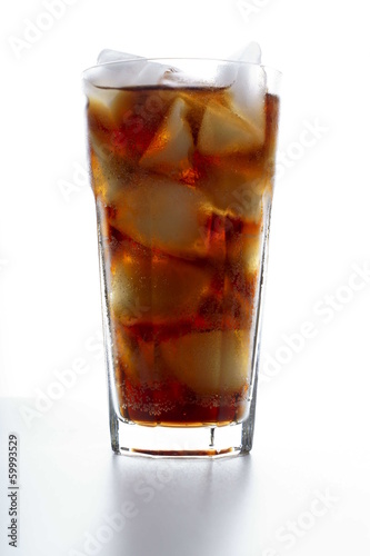 Cola with ice in glass