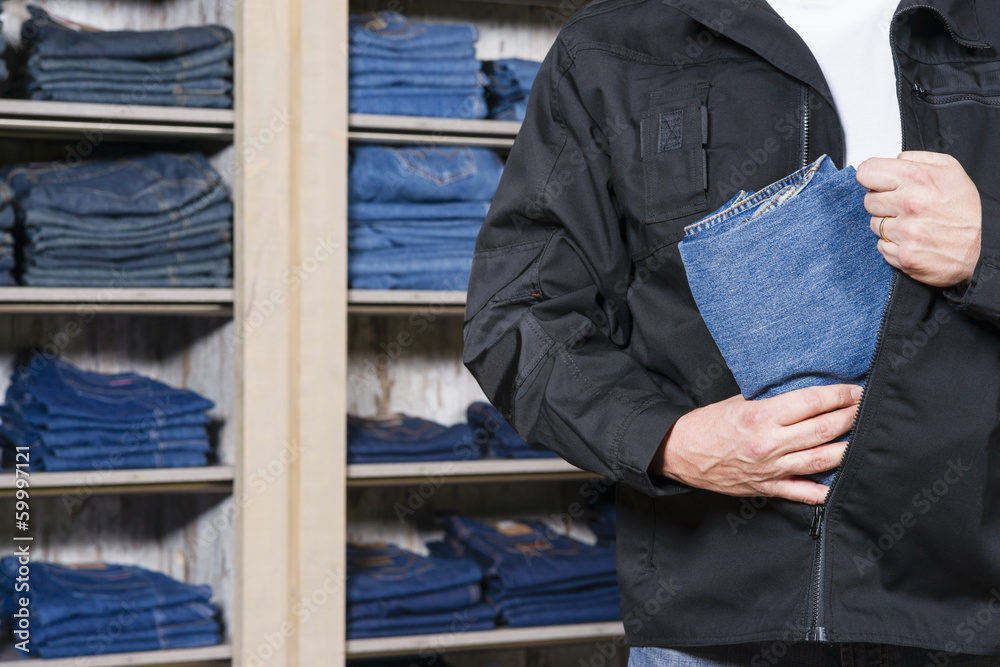 shoplifter stealing denim shoplifter stealing denim