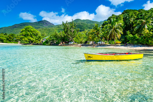 tropical beach with a boat