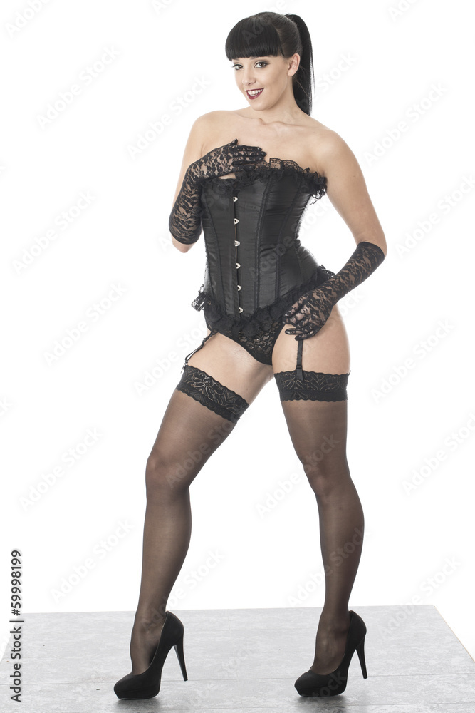 BDSM Fetish Model Posing in Stockings and Corset BDSM Fetish Model Posing in Stockings and Corset