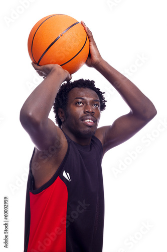 Basketball player with ball, isolated on a white background