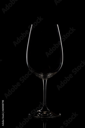 Empty wine glass on dark background
