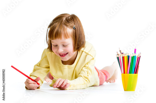 kid girl drawing with pencils