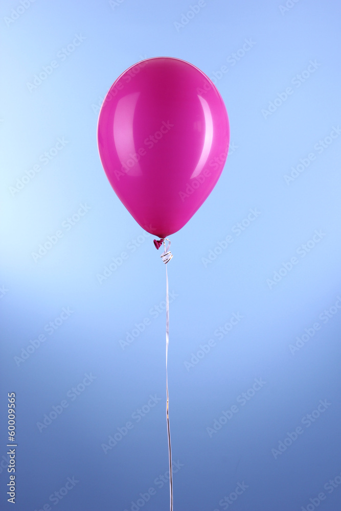 Purple one balloon on blue background Purple one balloon on blue background