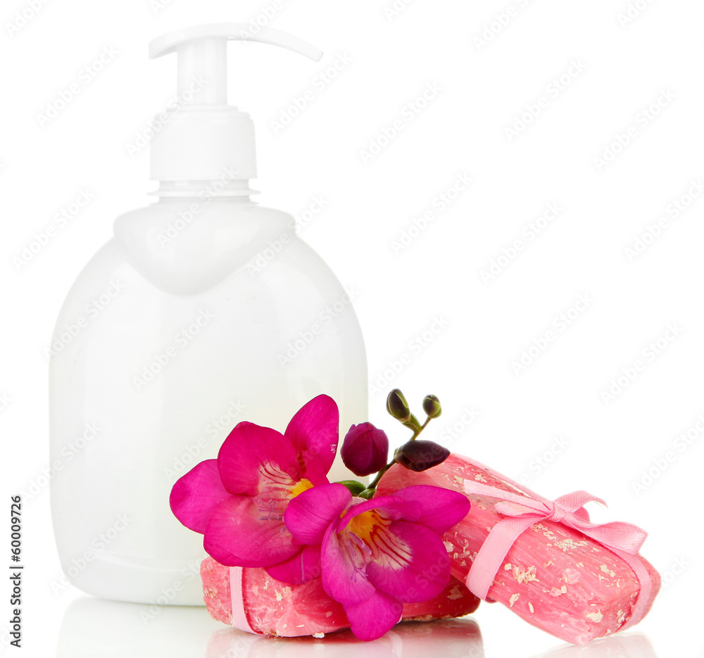Liquid and hand-made soaps isolated on white Liquid and hand-made soaps isolated on white