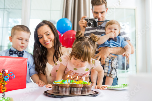 Family Celebrating Girl s Birthday At Home