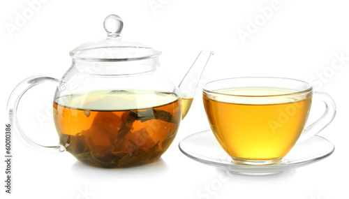 Cup and teapot of green tea isolated on white
