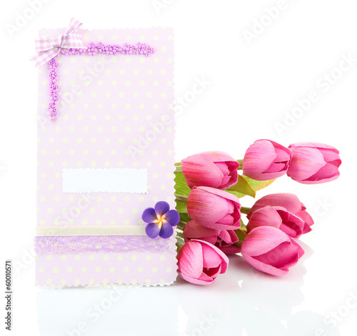 Beautiful hand made post card and flowers, isolated on white © Africa Studio