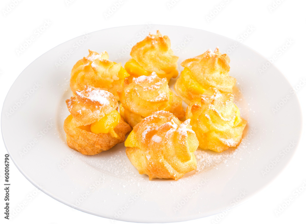 Home made cream puff on a white background Home made cream puff on a white background