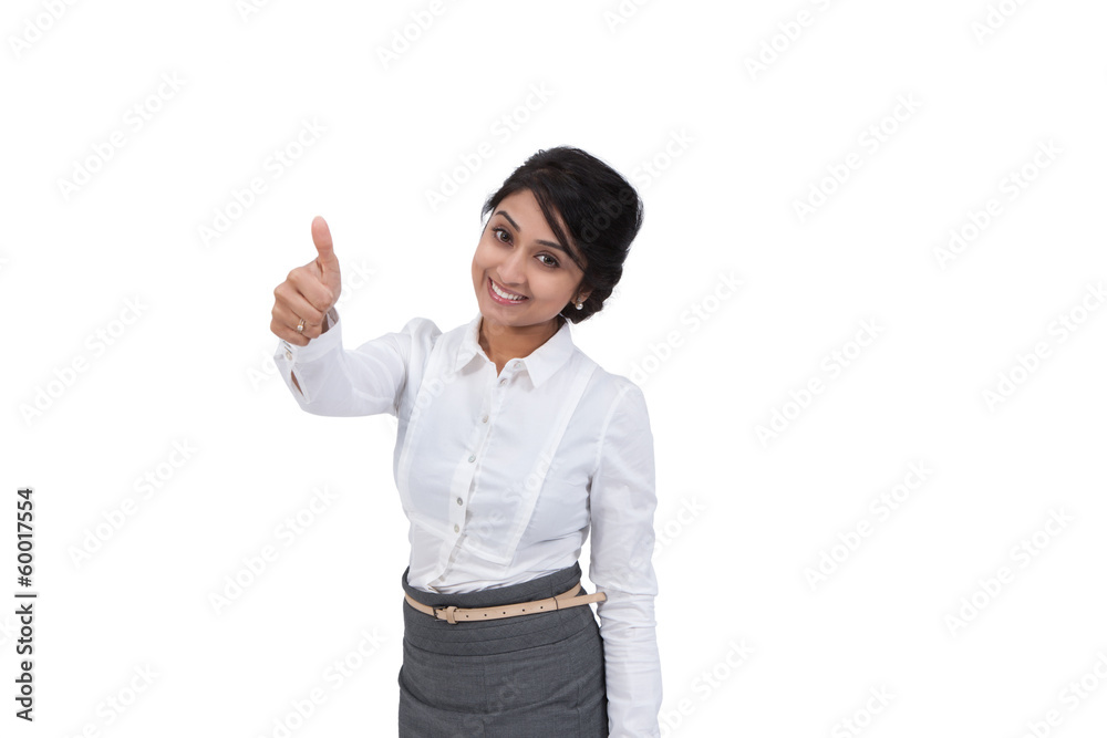 Attractive Asian businesswoman showing a thumbs up Attractive Asian businesswoman showing a thumbs up