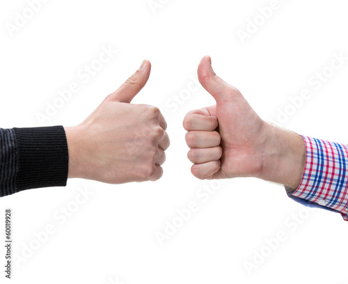 Two male hands showing thumbs up sign