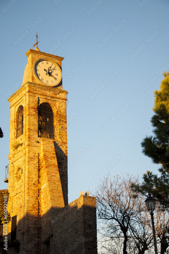 campanile con orologio villaggio di fiorenzuola Stock Photo | Adobe Stock