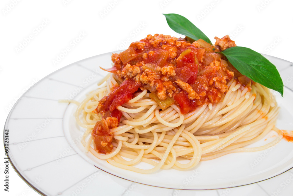 Spaghetti with tomato sauce on a plate . Spaghetti with tomato sauce on a plate .