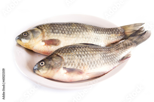 Crucian fish on a plate