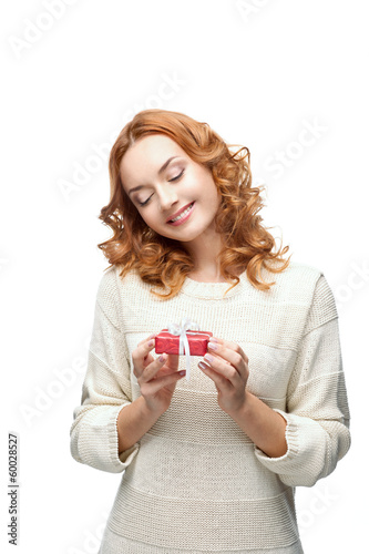 happy woman holding gift © photo-nuke