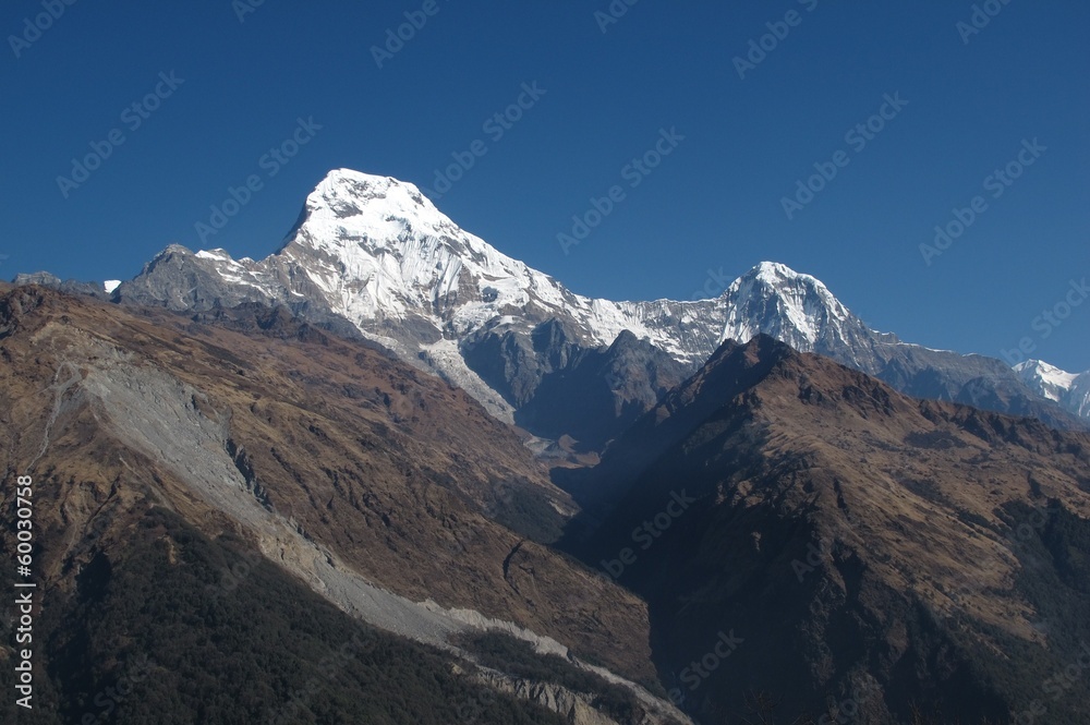 Annapurna South and Hiun Chuli, high mountains in Nepal Annapurna South and Hiun Chuli, high mountains in Nepal