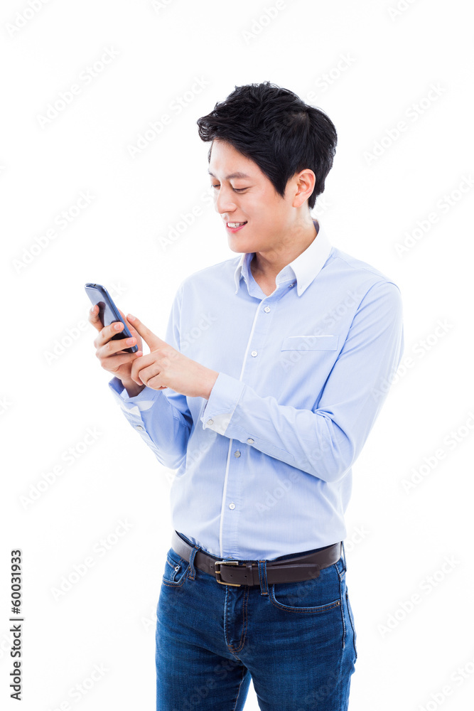 Young Asian man using phone Young Asian man using phone
