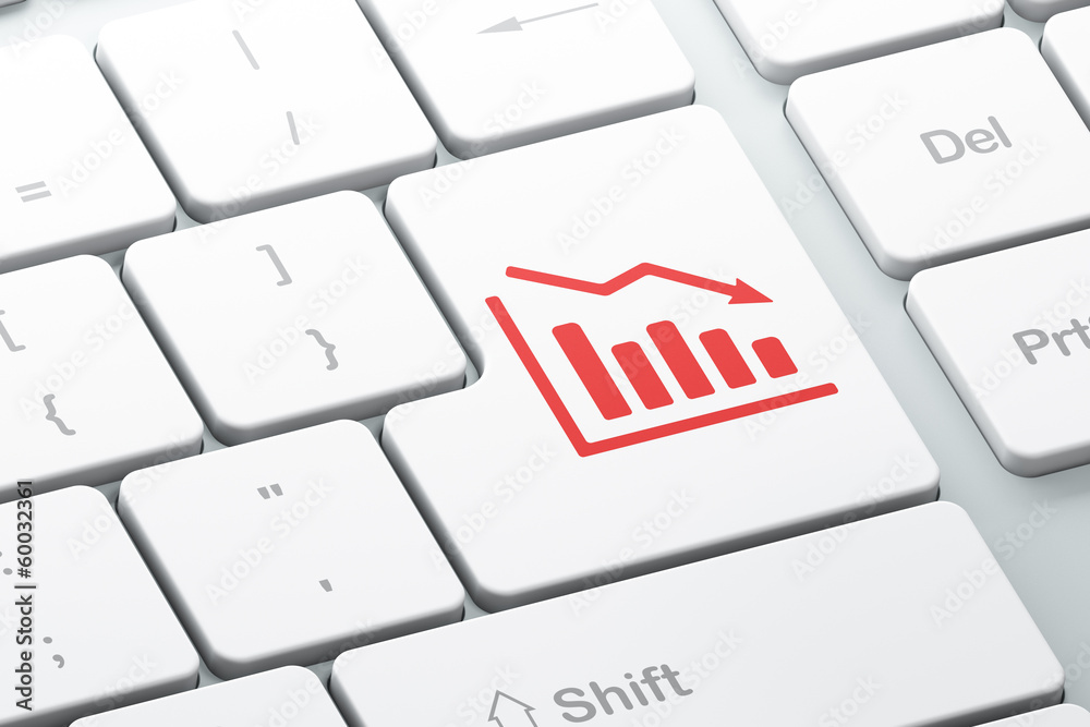 News concept: Decline Graph on computer keyboard background News concept: Decline Graph on computer keyboard background
