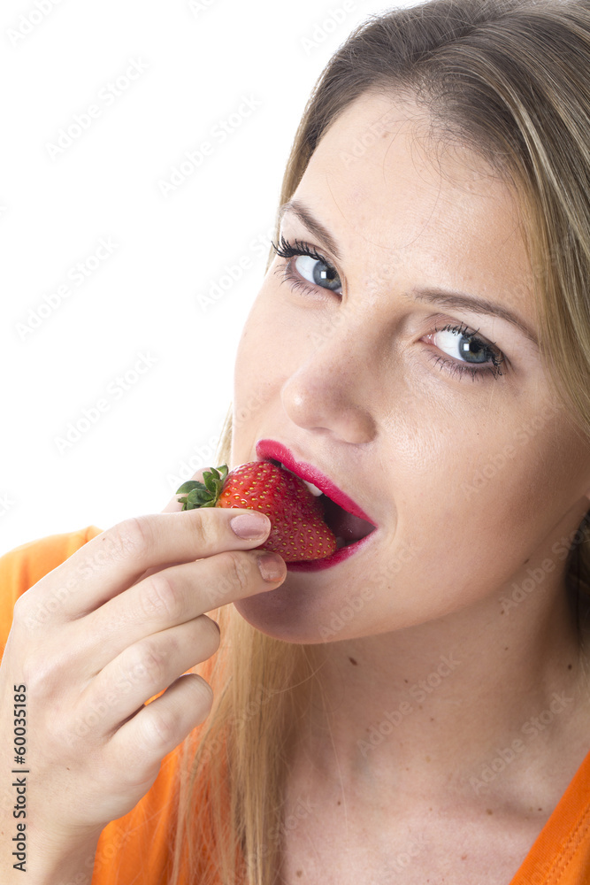 Young Woman Eating a Strawberry Young Woman Eating a Strawberry