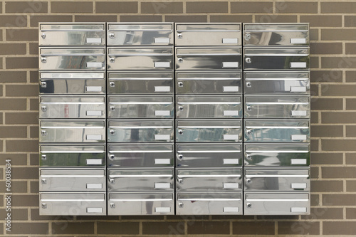 Mailboxes in a building houses photo