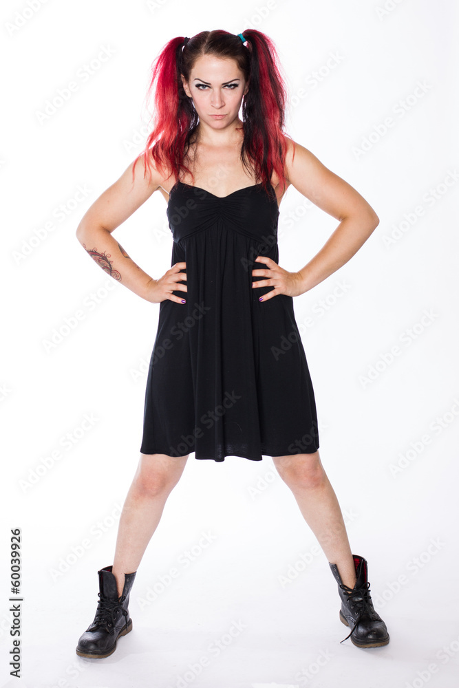 Serious Punk Girl in Combat Boots and Black Dress Serious Punk Girl in Combat Boots and Black Dress