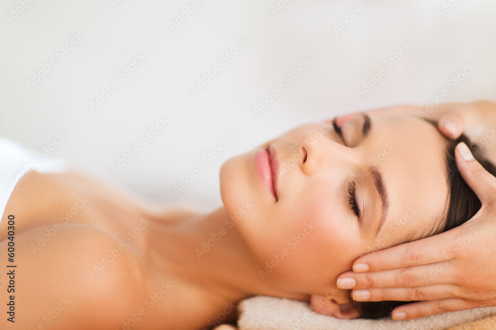 Fototapeta premium beautiful woman in spa salon having facial