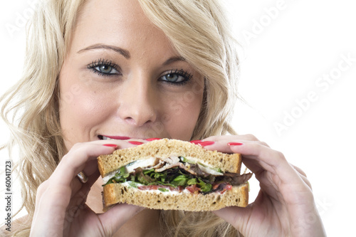 Young Woman Eating a Sandwich