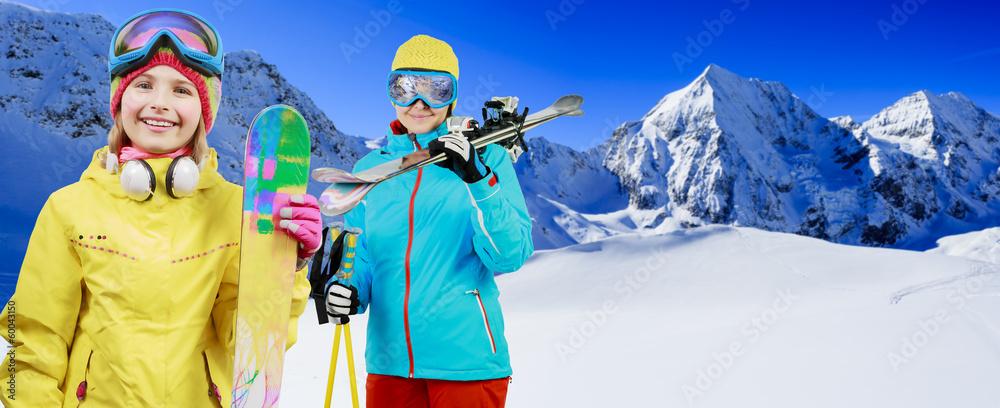 Ski, skiers - family enjoying winter vacations