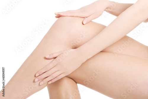 Woman s smooth knee  pampiering. Spa concept.