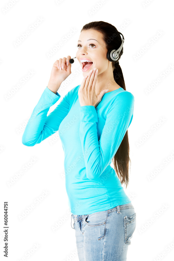 Young casual woman with headphones and microphone. Young casual woman with headphones and microphone.
