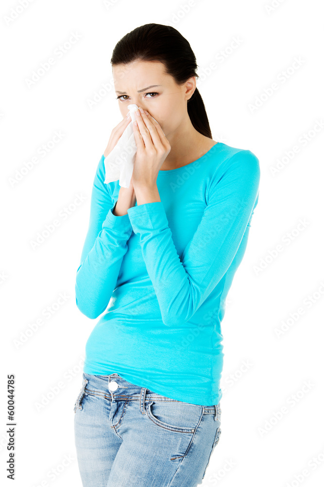 Young casual woman with tissue. Young casual woman with tissue.