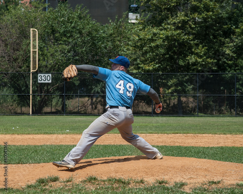 Pitcher at Mound, Throwing the Ball