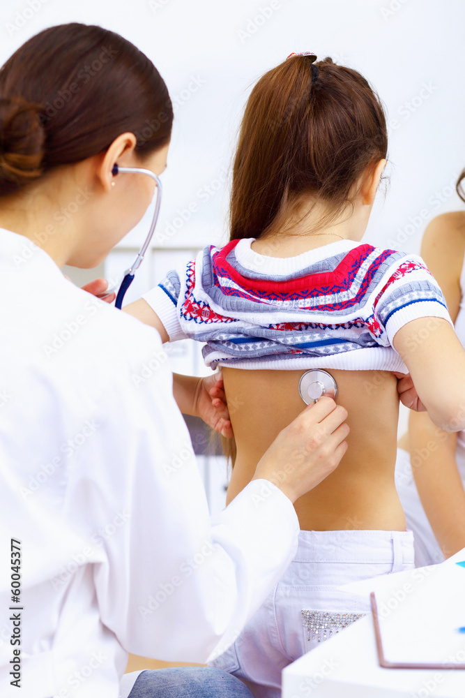 Little girl and a doctor