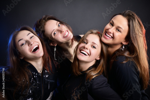 fashionable attractive happy party teen girls have fun and laugh