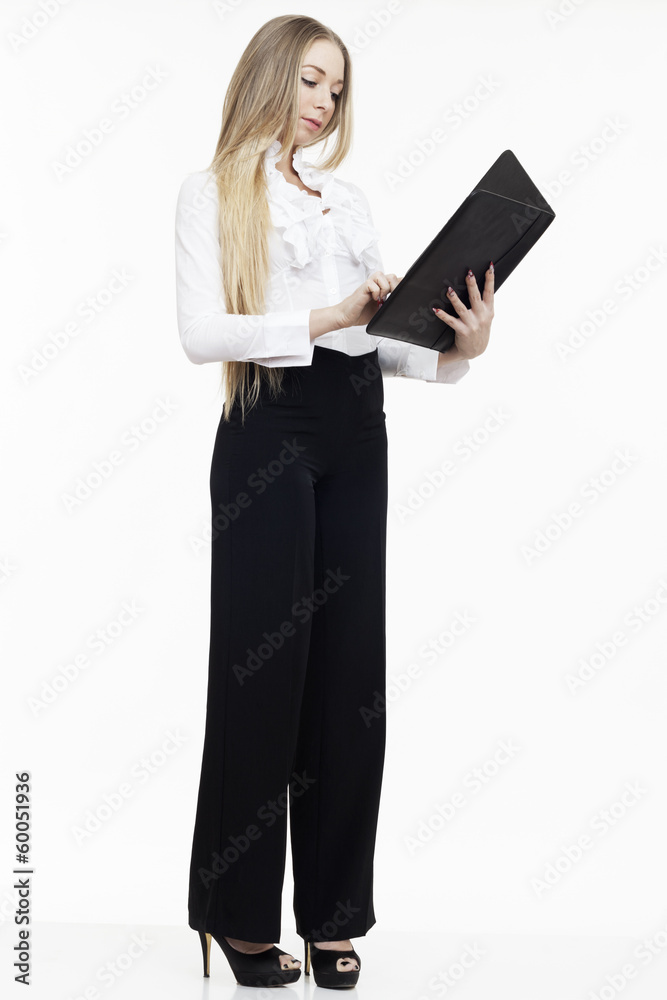 young business woman smiling using touch pad tablet pc isolated young business woman smiling using touch pad tablet pc isolated