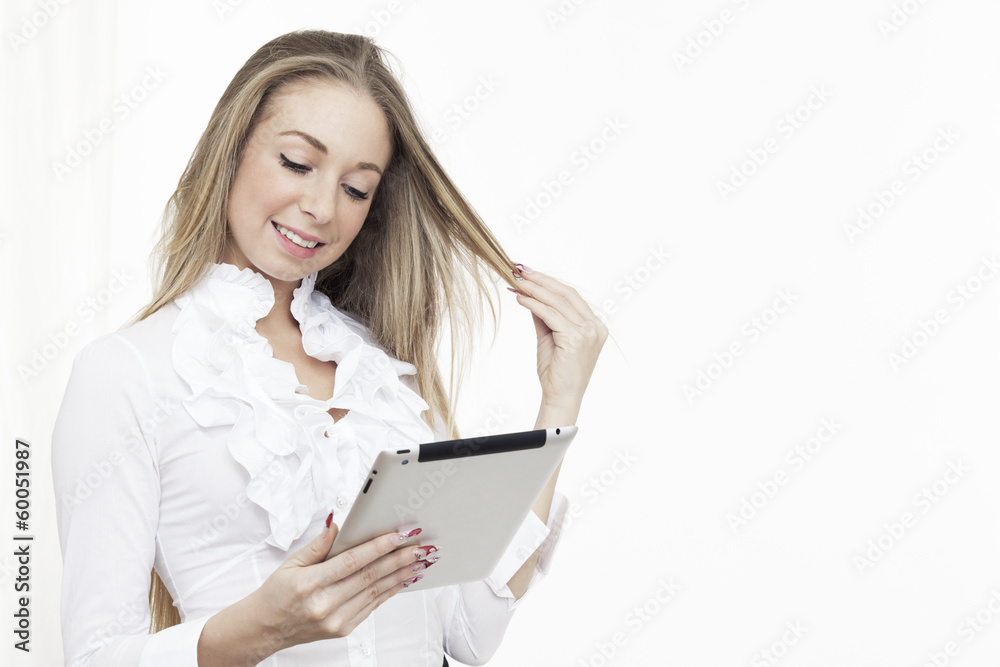 young business woman smiling using touch pad tablet pc isolated young business woman smiling using touch pad tablet pc isolated