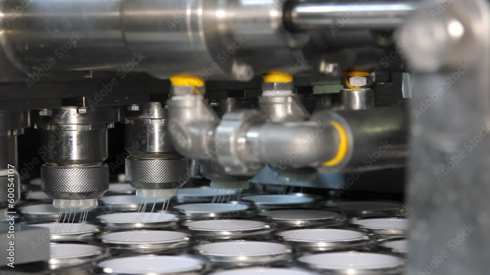 Industrial equipment for filling yogurt in plastic cups Industrial equipment for filling yogurt in plastic cups